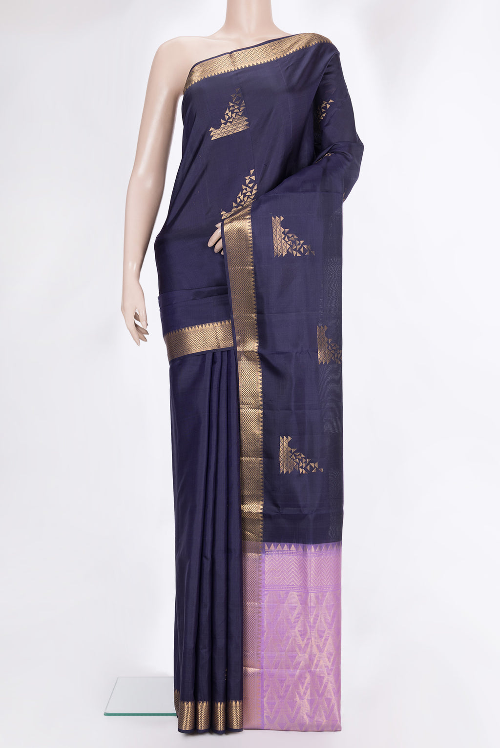Pure Silk Navy Blue Soft Saree with Zari Butta on the body and Zari Border.  displayed on a mannequin
