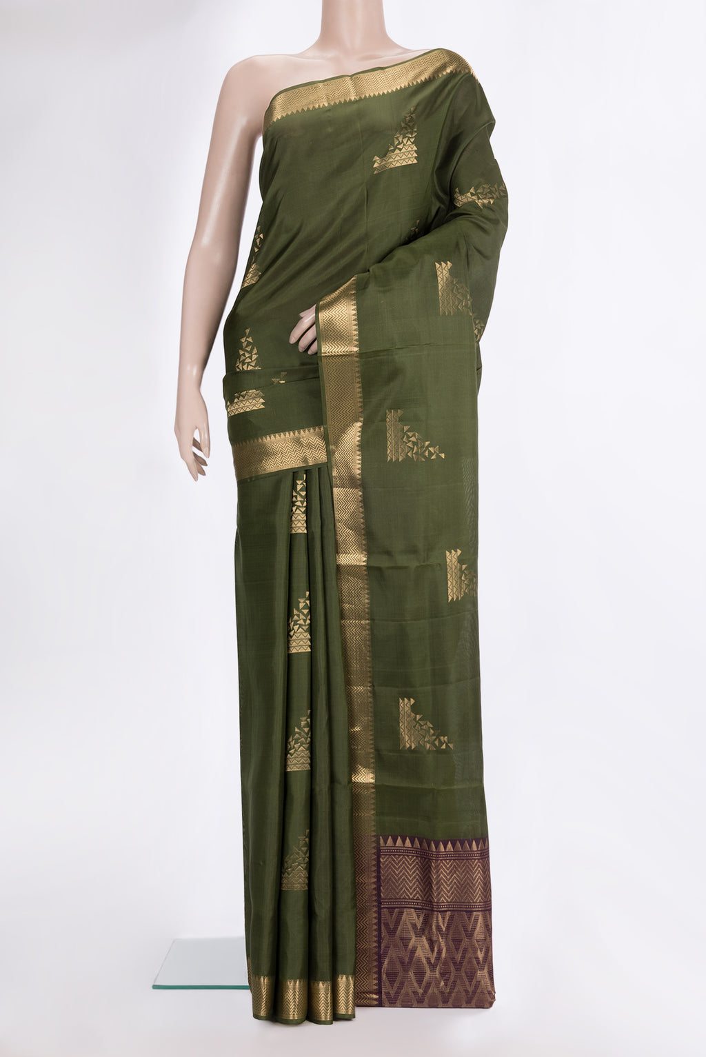 Pure Silk Olive Green Soft Saree with Zari Butta on the body and Zari Border.  displayed on a mannequin