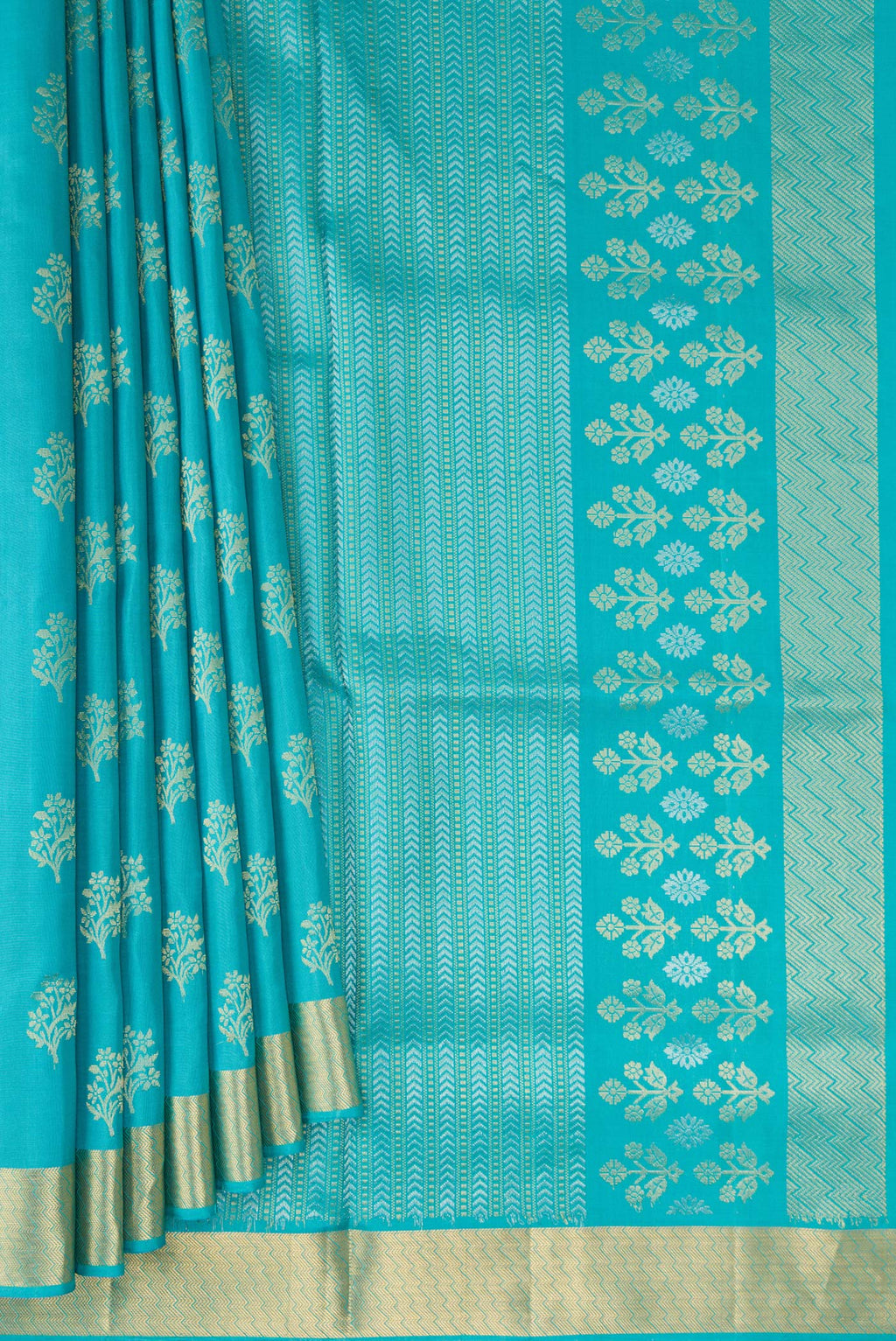 Pleats and pallu of Pure Silk Turquoise Soft Saree with Zari Butta on the body and Zari Border. 