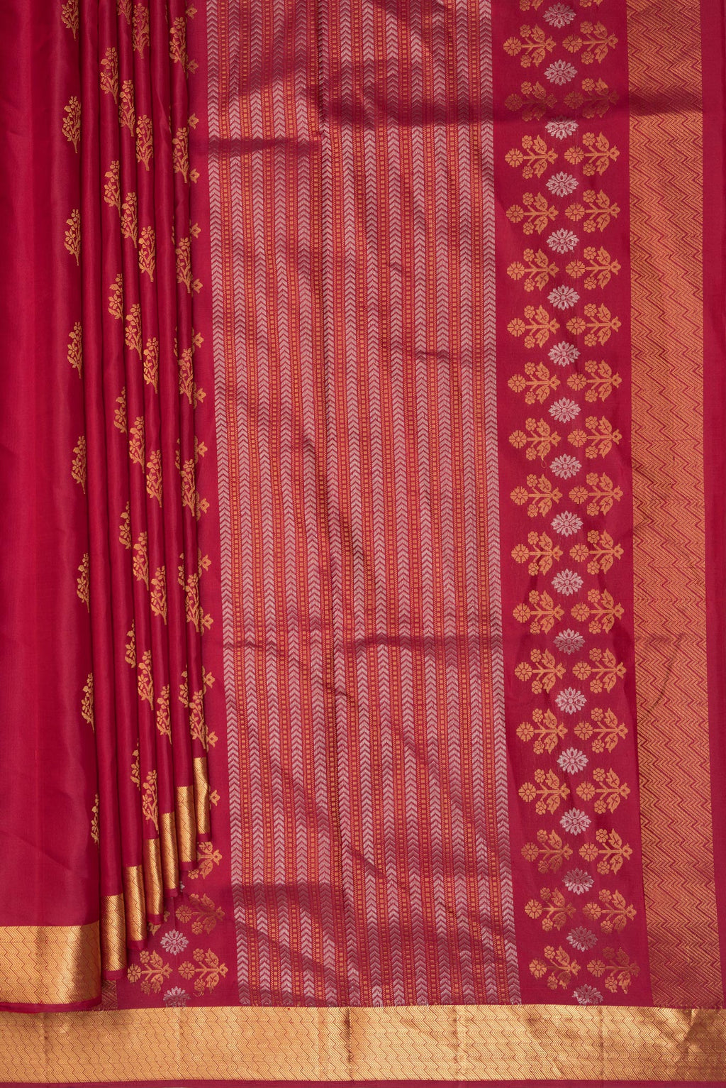 Pleats and pallu of Pure Silk Red Soft Saree with Zari Butta on the body and Zari Border. 