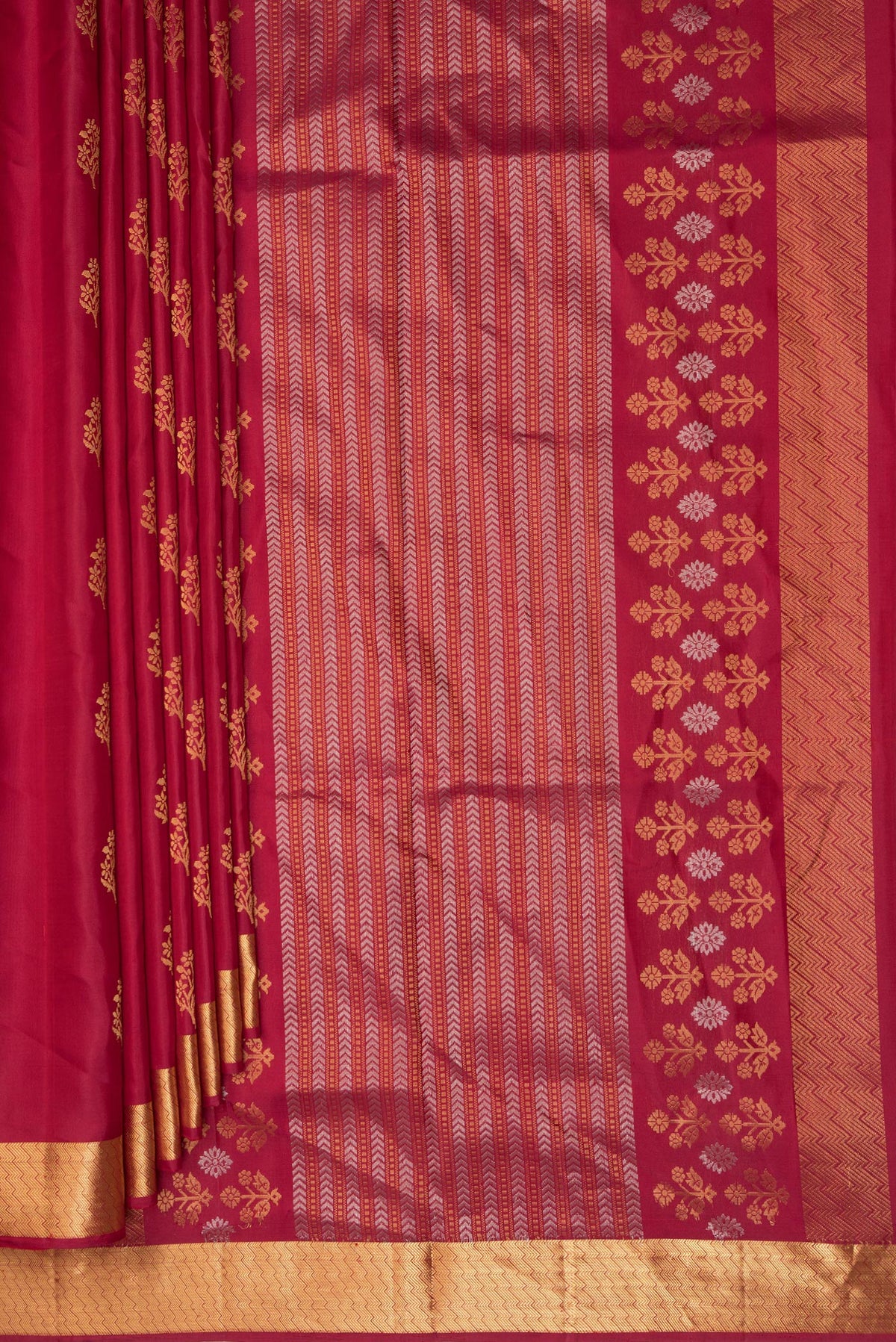 Pleats and pallu of Pure Silk Red Soft Saree with Zari Butta on the body and Zari Border. 
