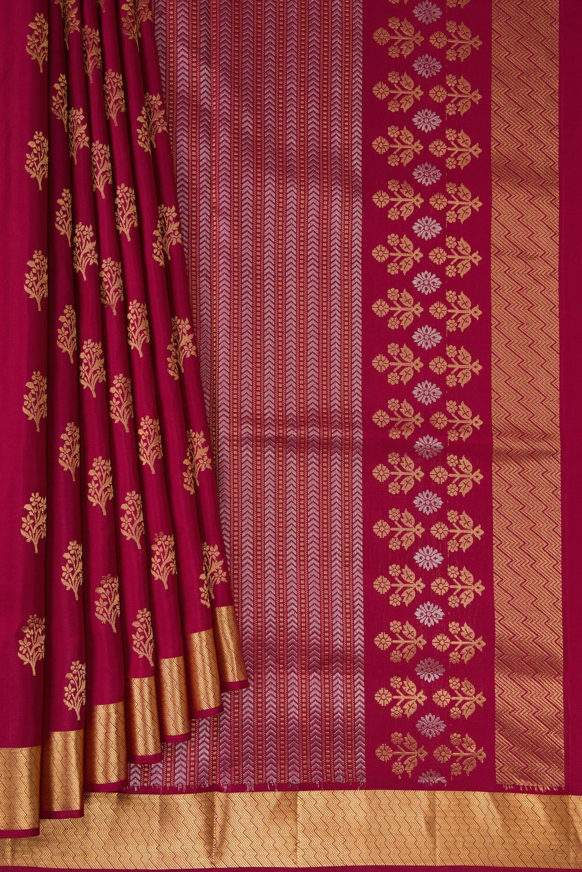 Pleats and pallu of Pure Silk Maroon Soft Saree with Zari Butta on the body and Zari Border. 