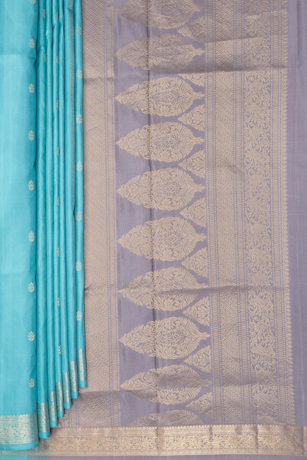 Pleats and pallu of Pure Silk Sky Blue Soft Saree with Zari Butta on the body and Zari Border. 