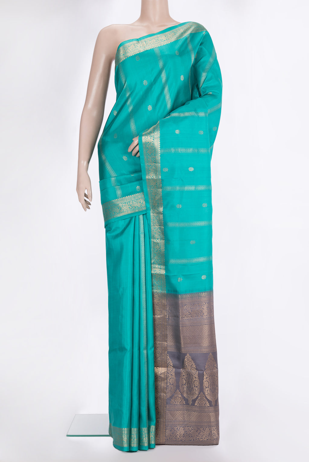 Pure Silk Turquoise Dual Tone Soft Saree with Zari Butta on the body and Zari Border.  displayed on a mannequin