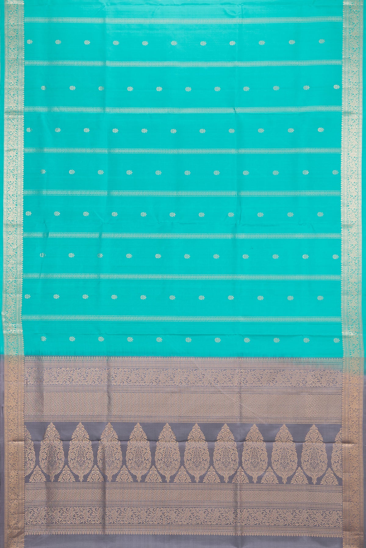 Flat view of Pure Silk Turquoise Dual Tone Soft Saree with Zari Butta on the body and Zari Border. 
