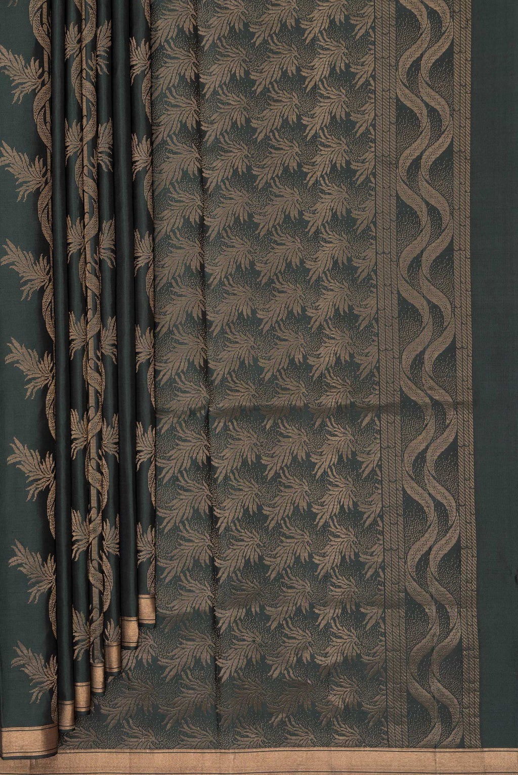 Pleats and pallu of Pure Silk Bottle Green Soft Saree with Zari Butta on the body and Zari Border. 