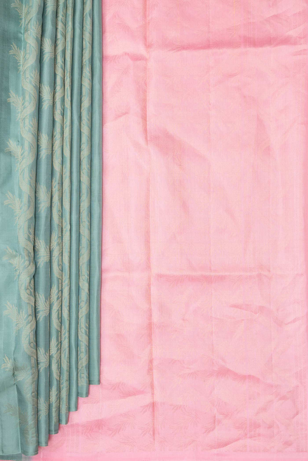 Pleats and pallu of Pure Silk Mint Green Soft Saree with Zari Butta on the body and Without Border. 