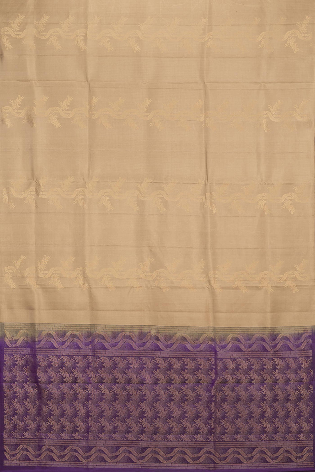 Flat view of Pure Silk Beige Soft Saree with Zari Butta on the body and Without Border. 
