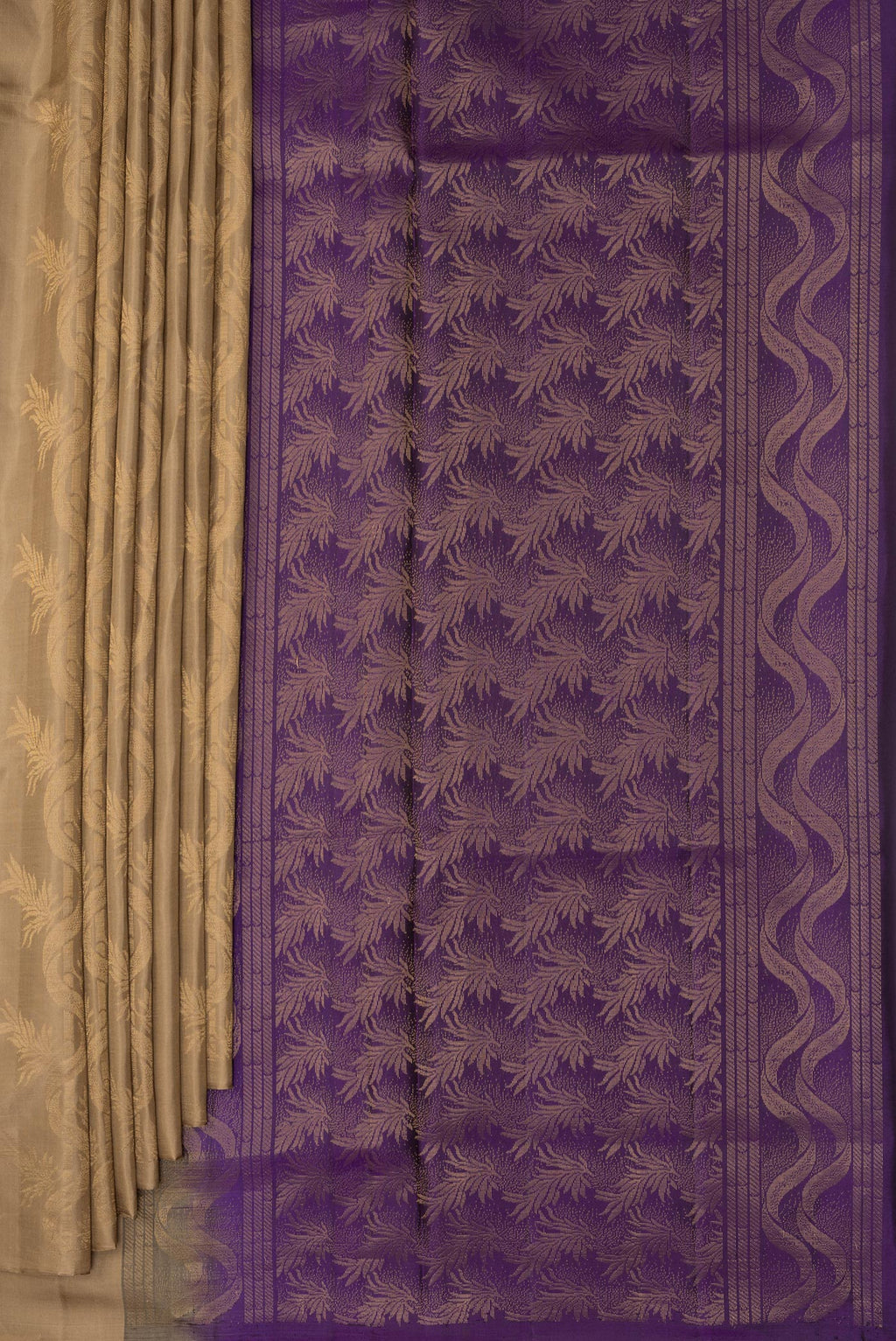 Pleats and pallu of Pure Silk Beige Soft Saree with Zari Butta on the body and Without Border. 