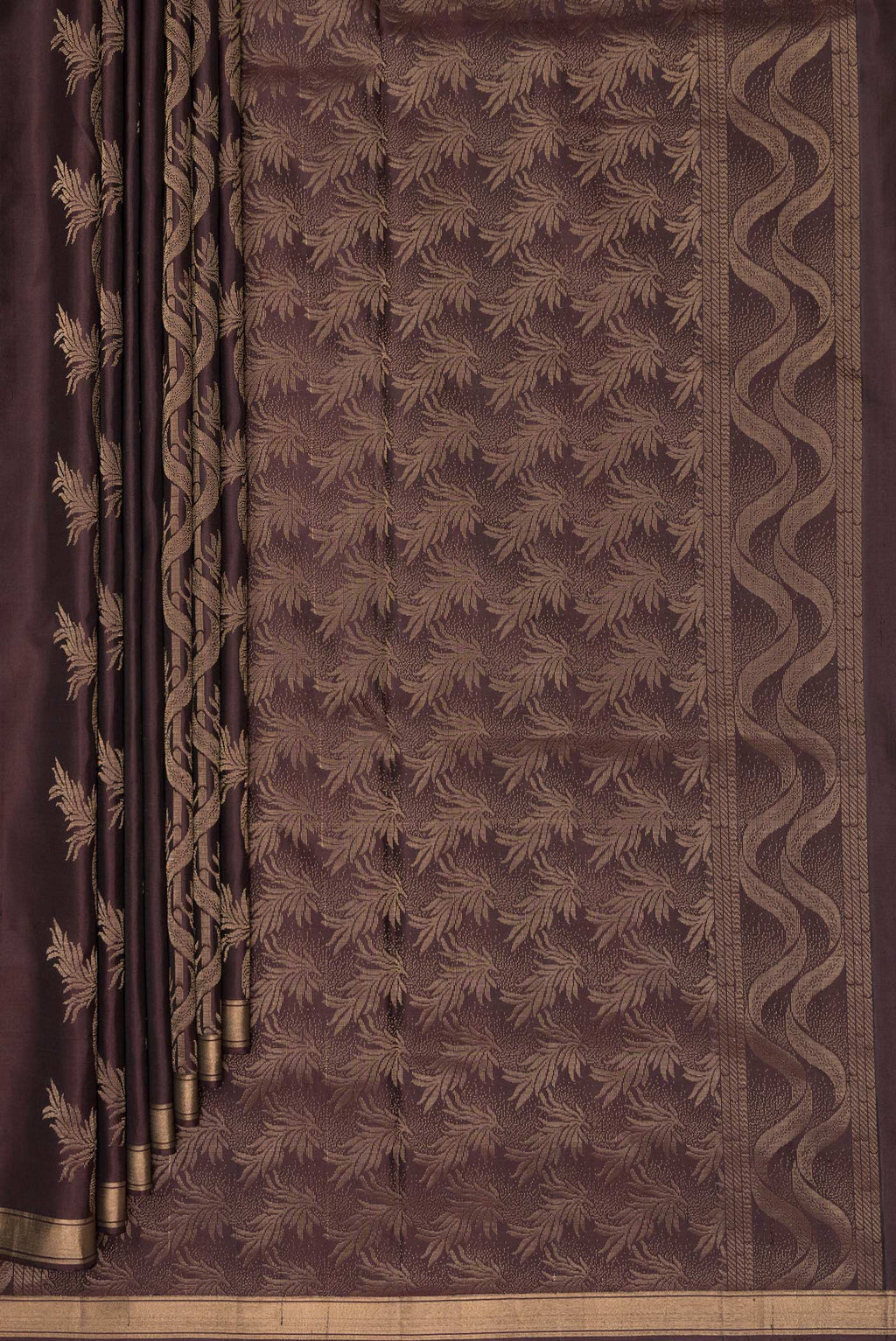 Pleats and pallu of Pure Silk Coffee Brown Soft Saree with Zari Butta on the body and Zari Border. 