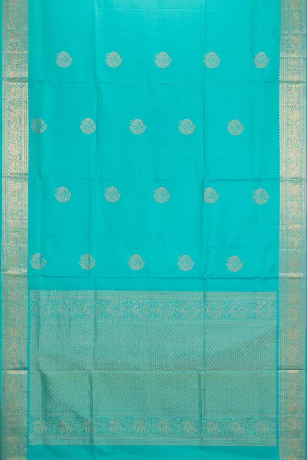 Flat view of Pure Silk Turquoise Soft Saree with Zari Butta on the body and Zari Border. 