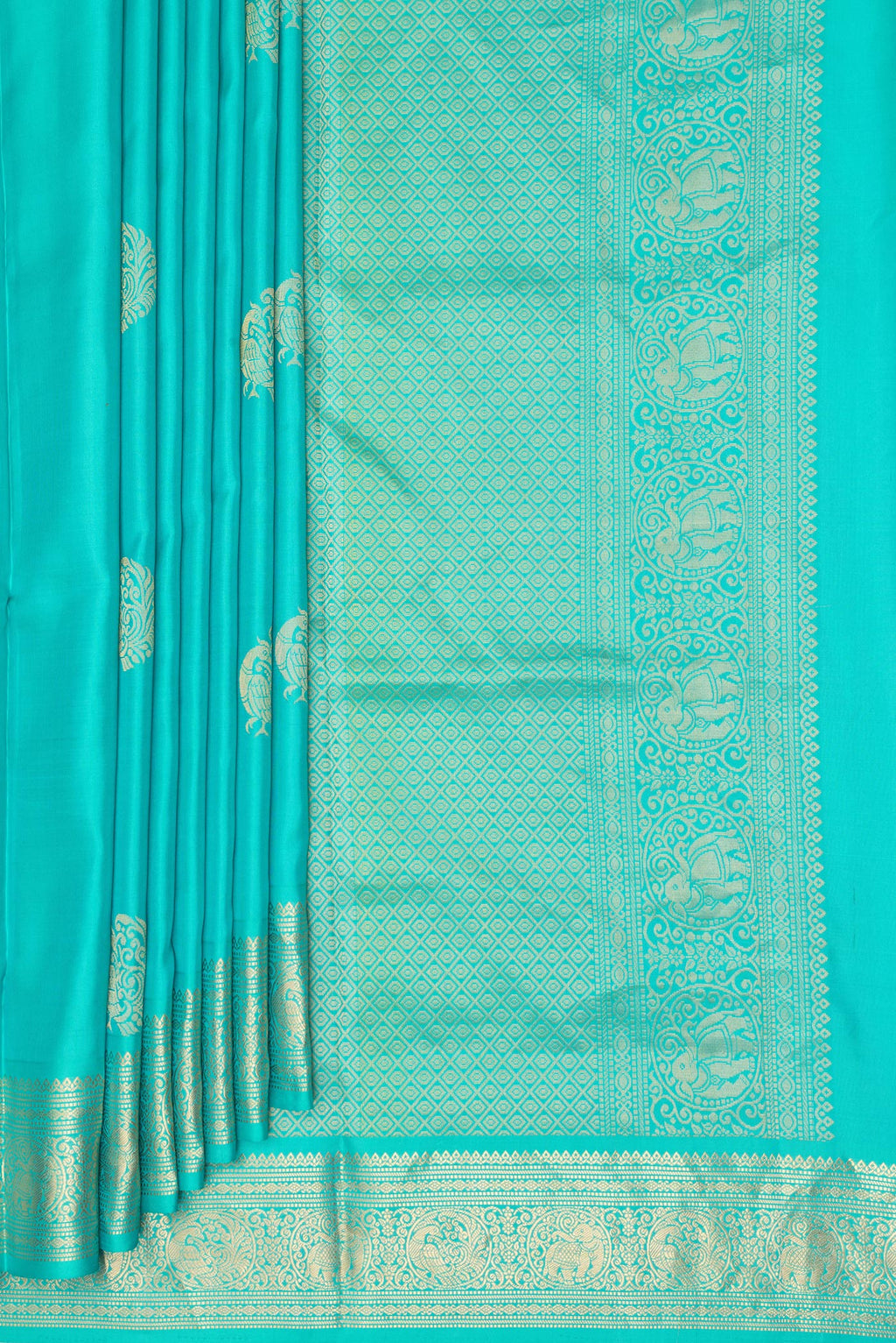 Pleats and pallu of Pure Silk Turquoise Soft Saree with Zari Butta on the body and Zari Border. 