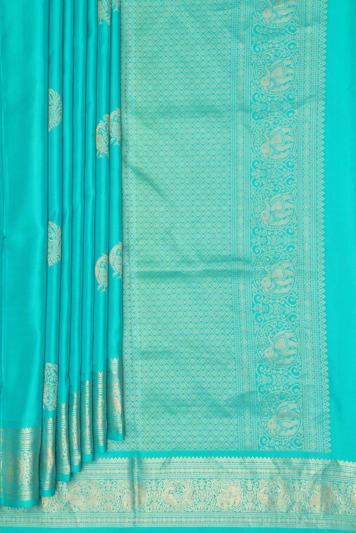 Pleats and pallu of Pure Silk Turquoise Soft Saree with Zari Butta on the body and Zari Border. 