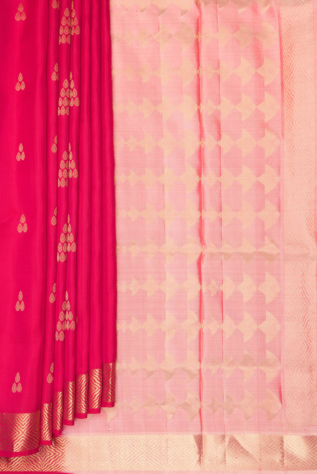 Pleats and pallu of Pure Silk Dark Pink Soft Saree with Zari Butta on the body and Zari Border. 