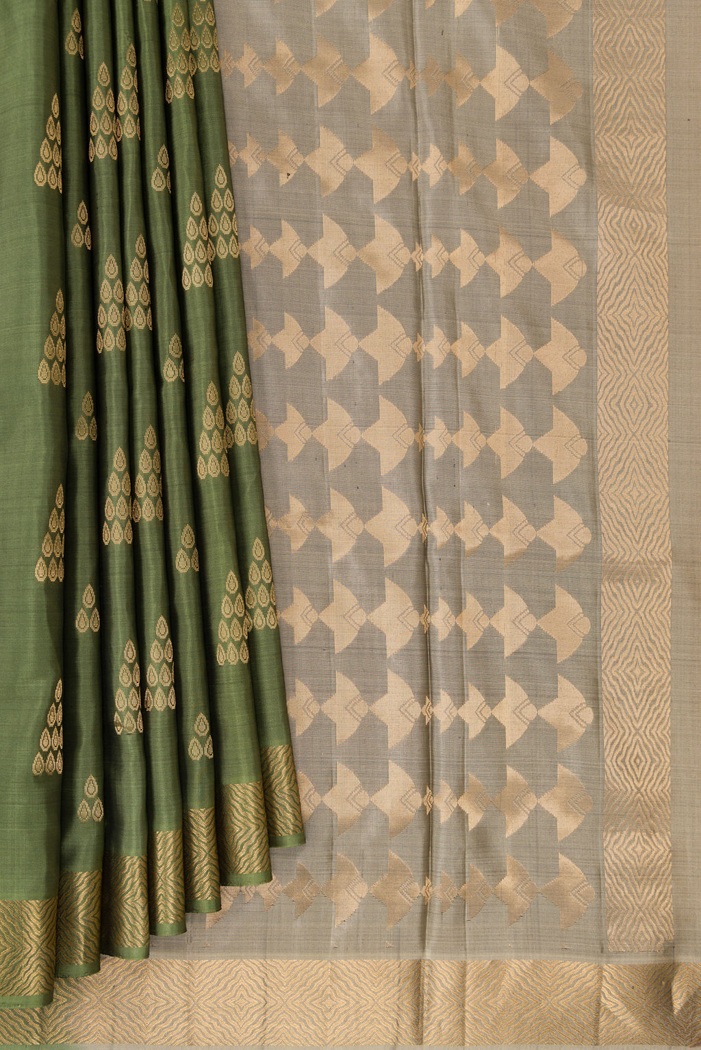 Pleats and pallu of Pure Silk Olive Green Soft Saree with Zari Butta on the body and Zari Border. 