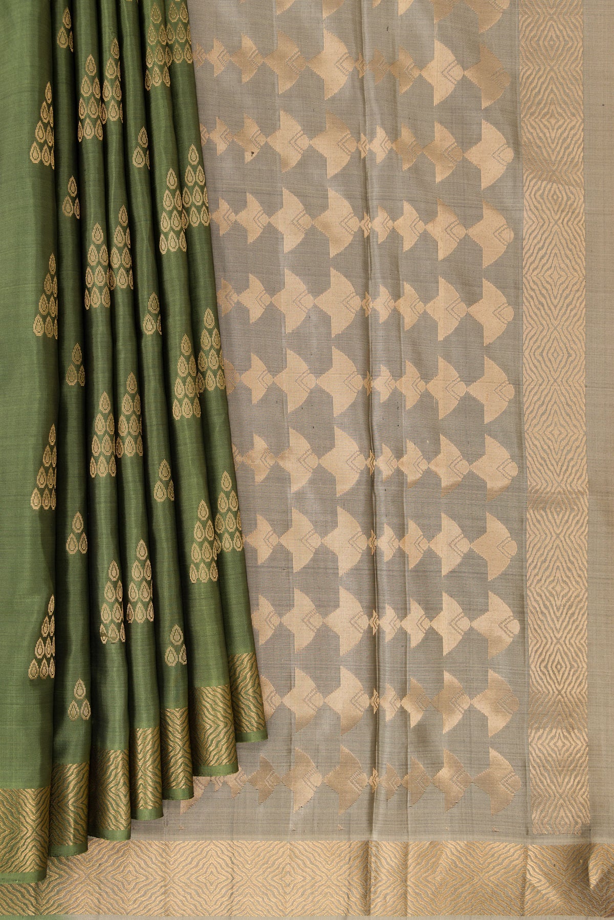 Pleats and pallu of Pure Silk Olive Green Soft Saree with Zari Butta on the body and Zari Border. 