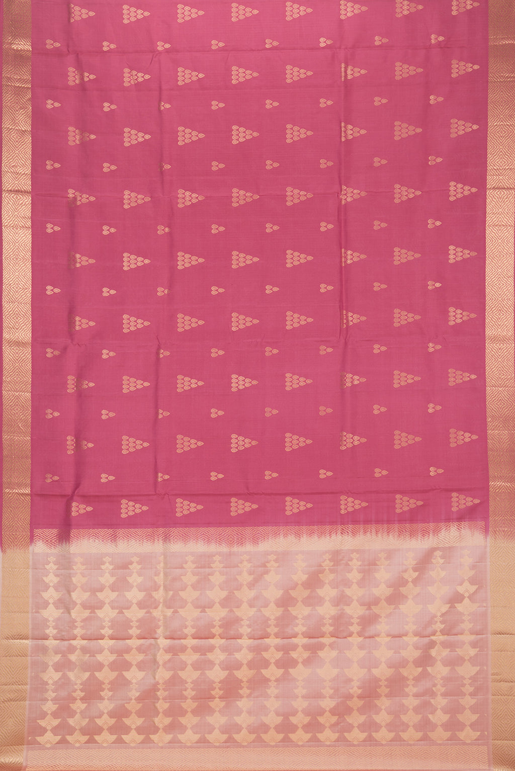 Flat view of Pure Silk Coral Soft Saree with Zari Butta on the body and Zari Border. 