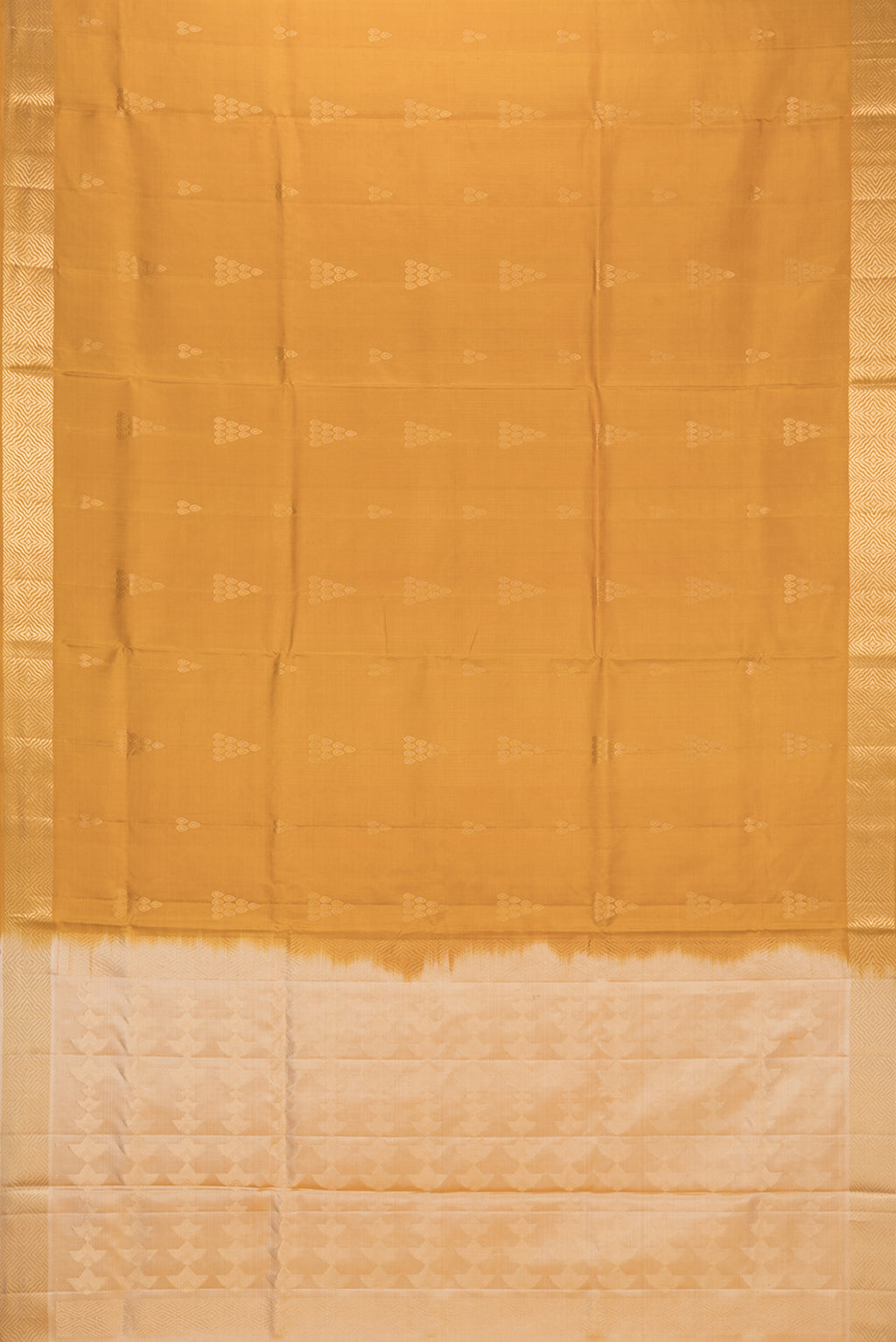 Flat view of Pure Silk Mustard Soft Saree with Zari Butta on the body and Zari Border. 