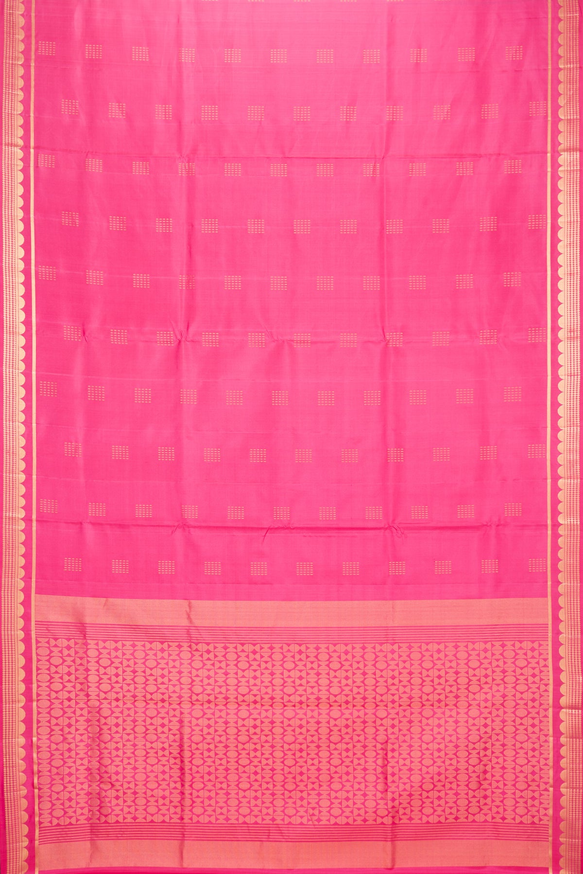 Flat view of Pure Silk Pink Soft Saree with Zari Butta on the body and Zari Border. 