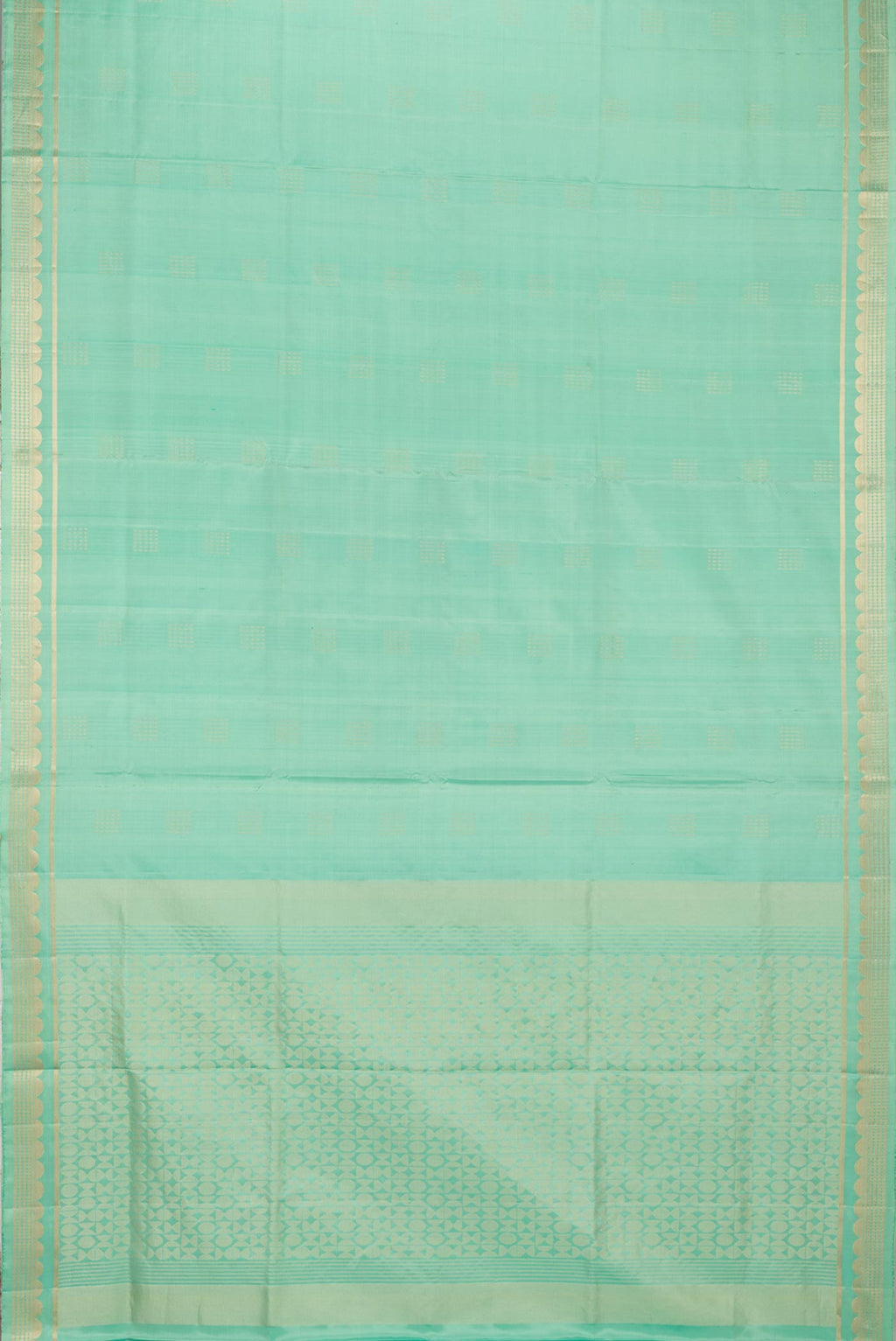 Flat view of Pure Silk Pista Green Dual Tone Soft Saree with Zari Butta on the body and Zari Border. 