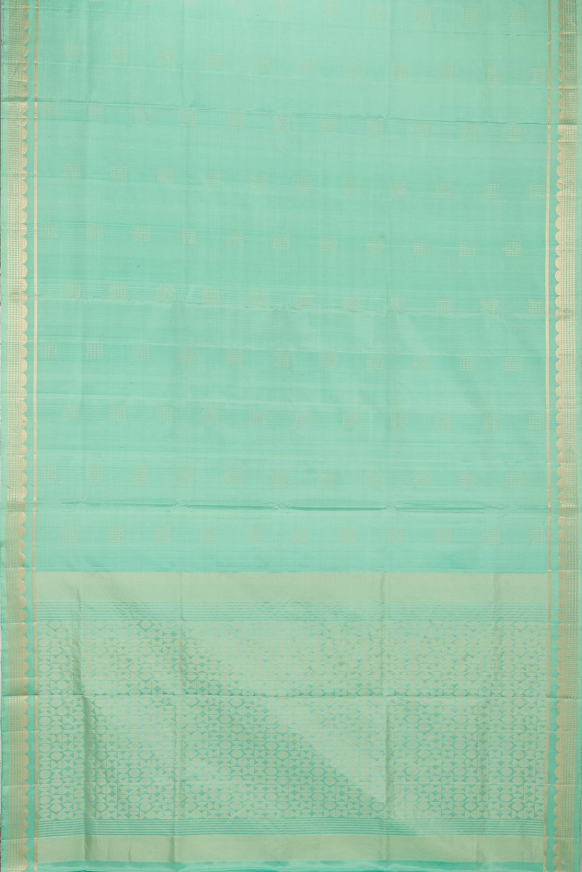 Flat view of Pure Silk Pista Green Dual Tone Soft Saree with Zari Butta on the body and Zari Border. 