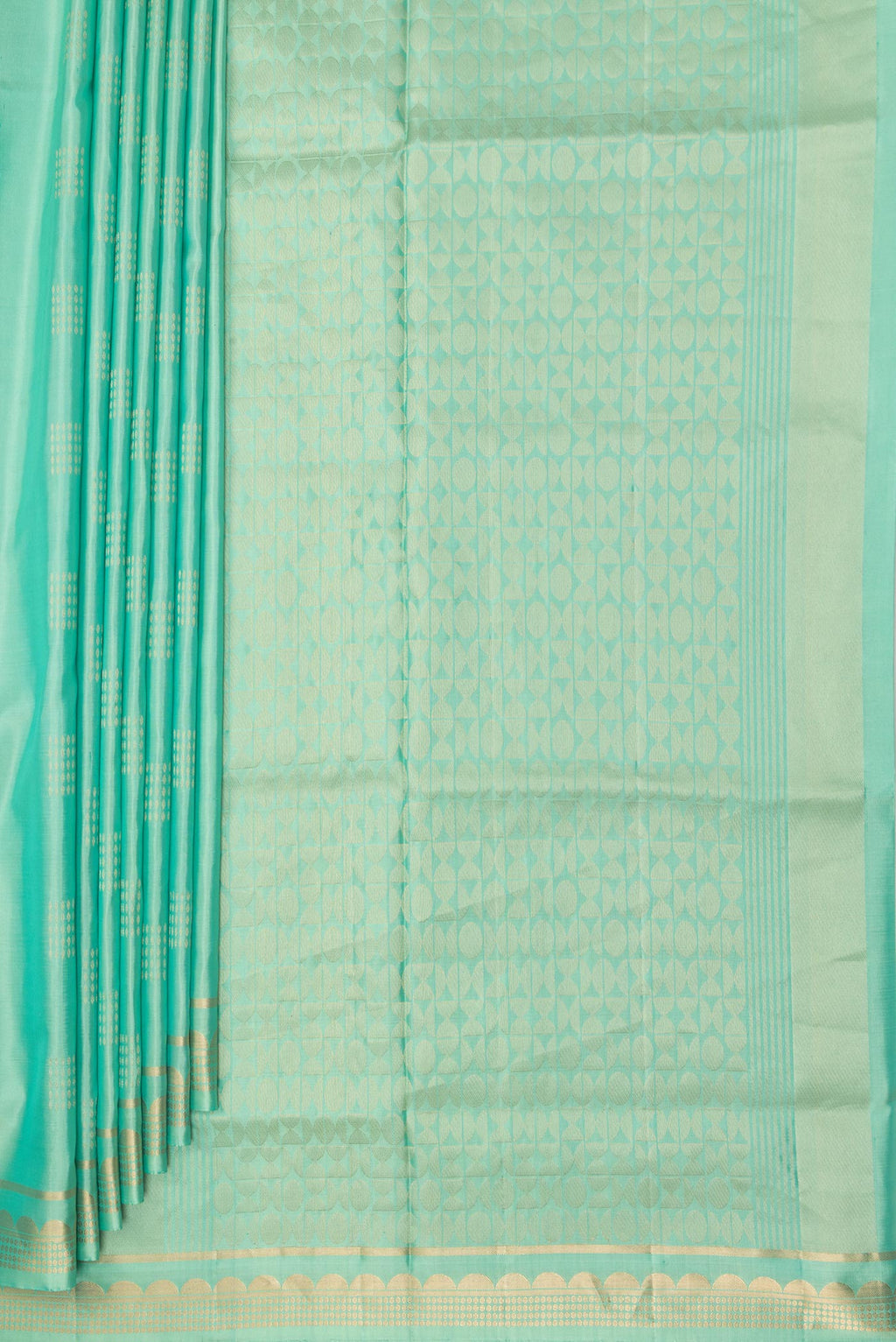 Pleats and pallu of Pure Silk Pista Green Dual Tone Soft Saree with Zari Butta on the body and Zari Border. 