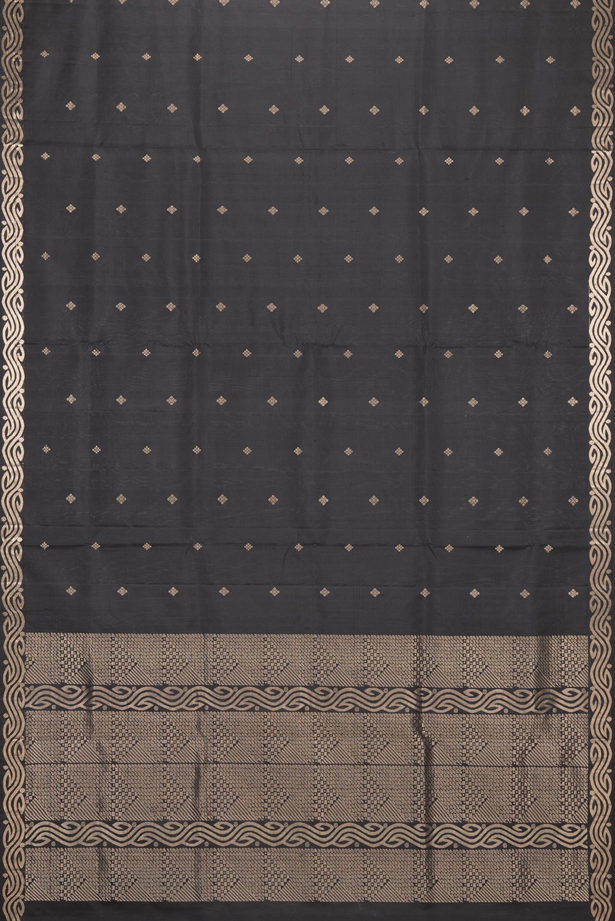 Flat view of Pure Silk Black Soft Saree with Zari Butta on the body and Zari Border. 