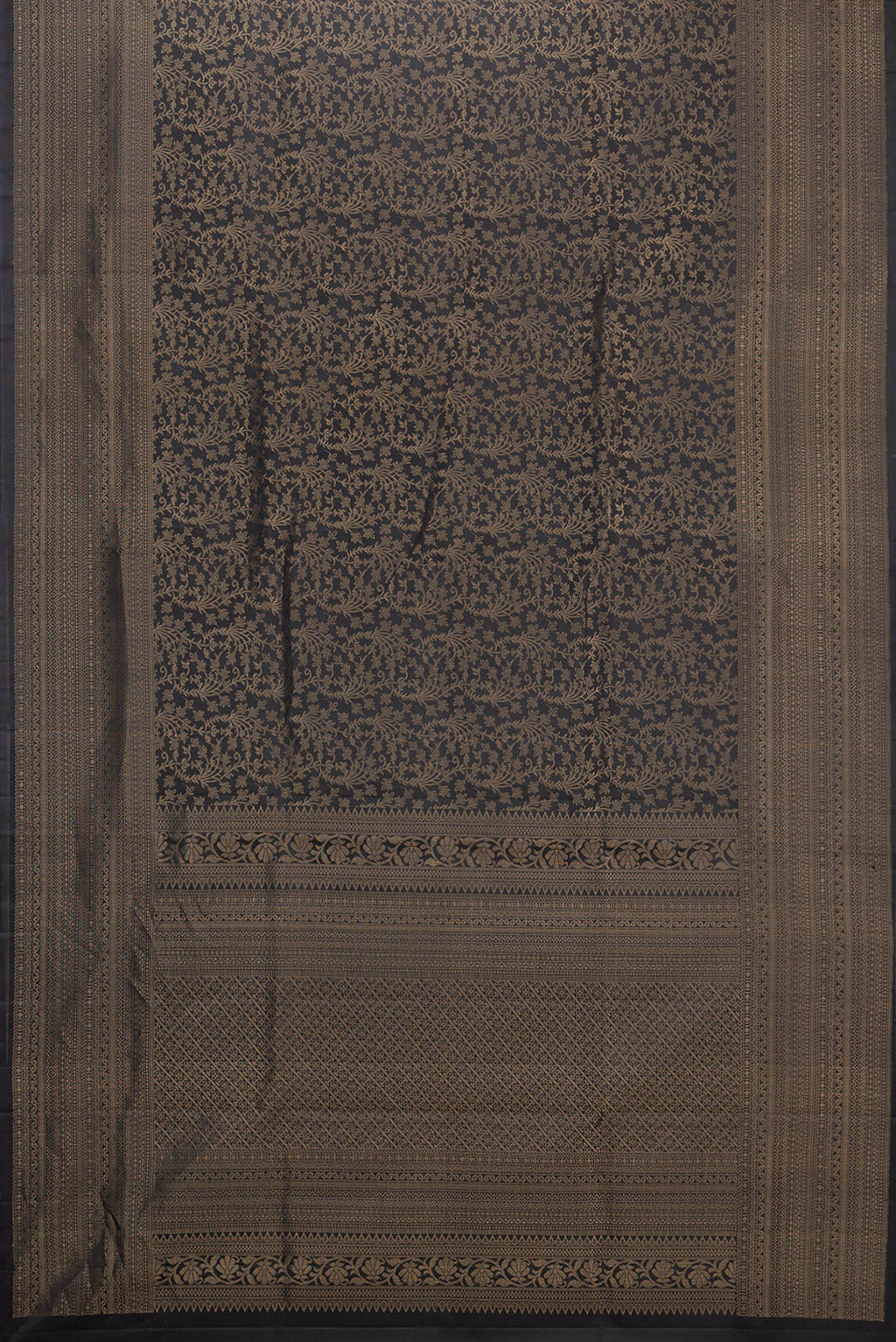 Flat view of Pure Silk Black Soft Saree with Zari Brocade on the body and Zari Border. 