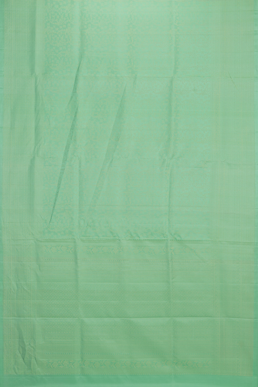 Flat view of Pure Silk Mint Green Soft Saree with Zari Brocade on the body and Zari Border. 
