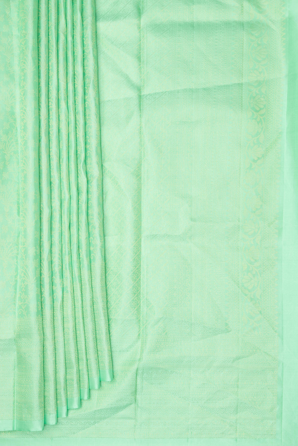 Pleats and pallu of Pure Silk Mint Green Soft Saree with Zari Brocade on the body and Zari Border. 