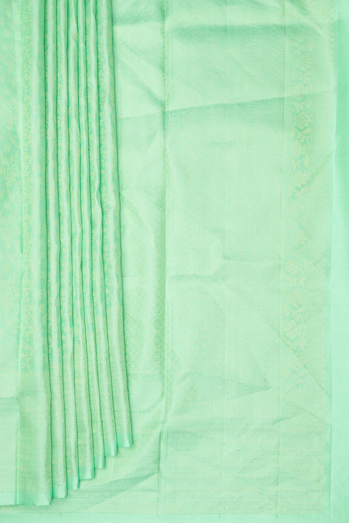 Pleats and pallu of Pure Silk Mint Green Soft Saree with Zari Brocade on the body and Zari Border. 