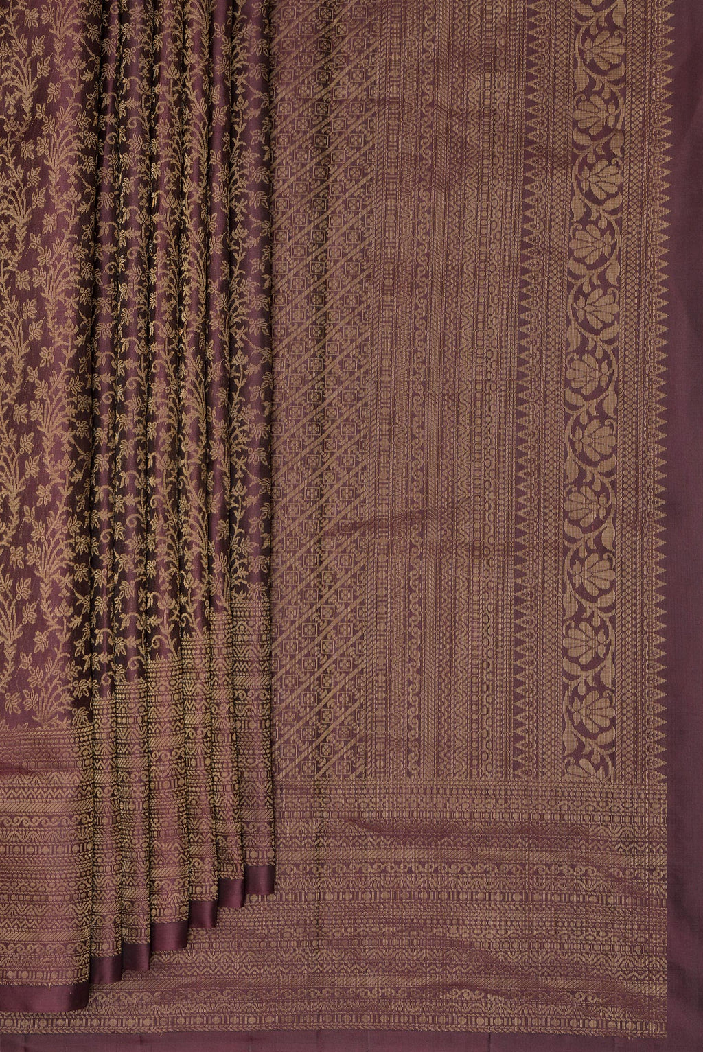 Pleats and pallu of Pure Silk Coffee Brown Soft Saree with Zari Brocade on the body and Zari Border. 