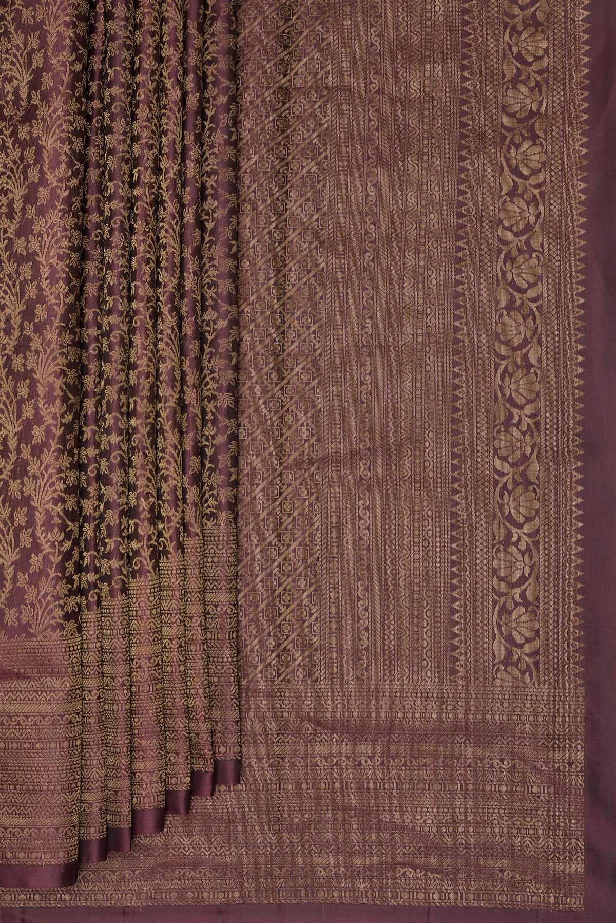 Pleats and pallu of Pure Silk Coffee Brown Soft Saree with Zari Brocade on the body and Zari Border. 