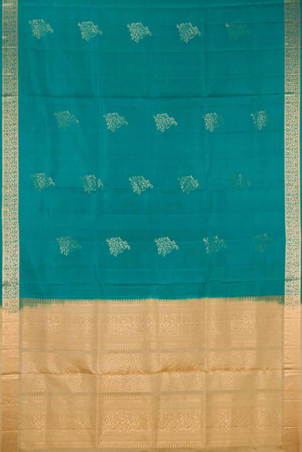 Flat view of Pure Silk Teal Soft Saree with Zari Butta on the body and Zari Border. 