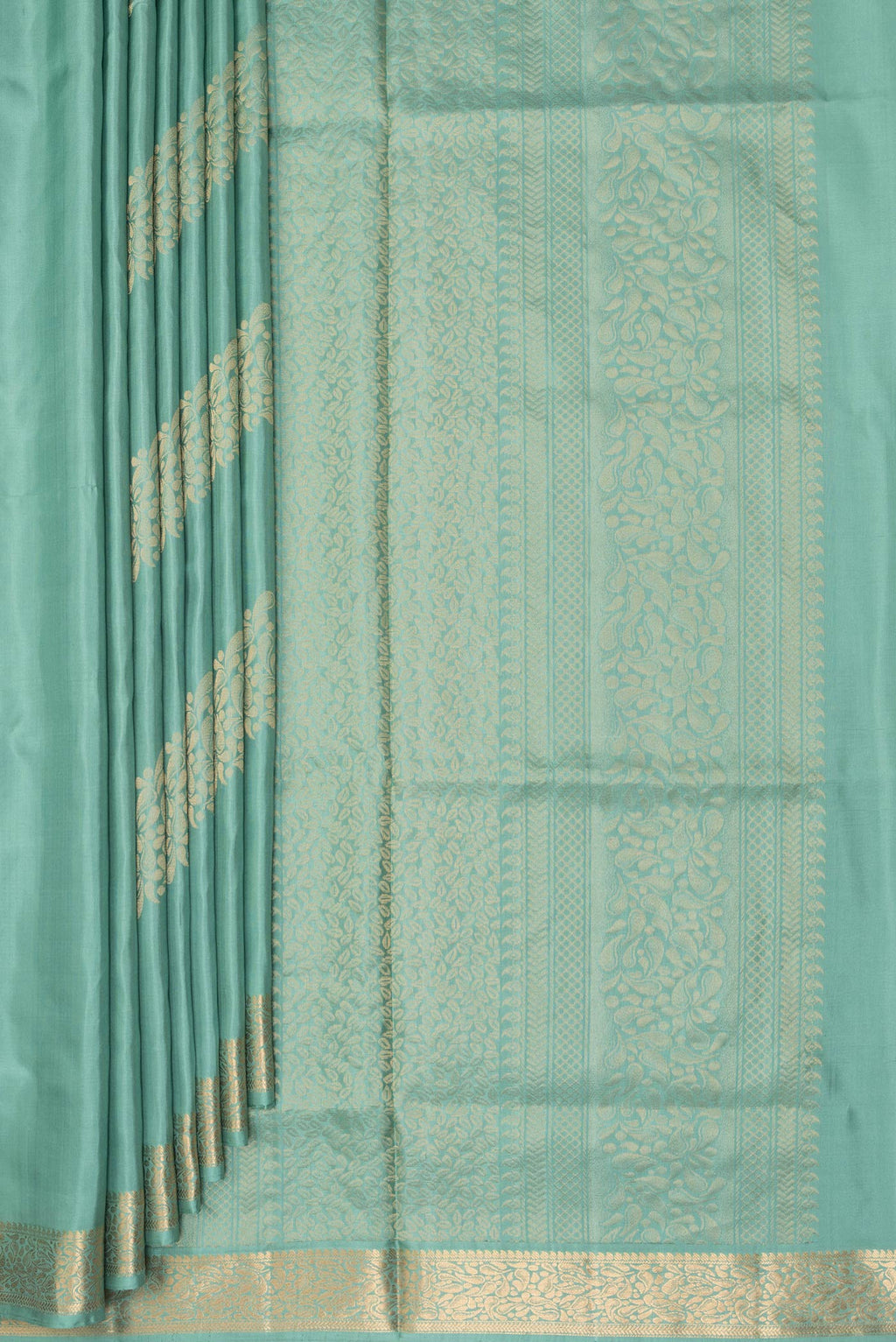 Pleats and pallu of Pure Silk Sea Green Soft Saree with Zari Butta on the body and Zari Border. 