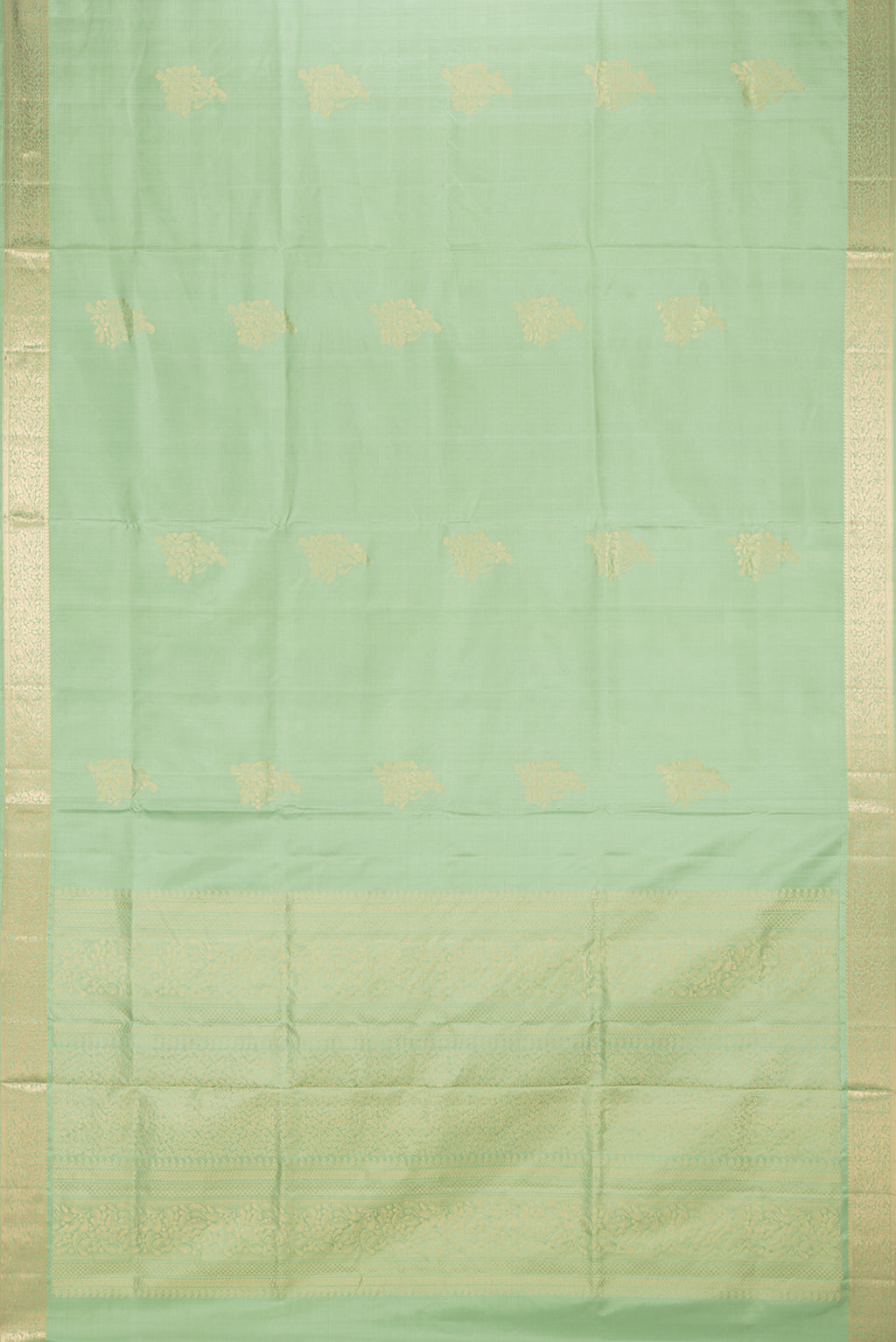 Flat view of Pure Silk Pista Green Soft Saree with Zari Butta on the body and Zari Border. 