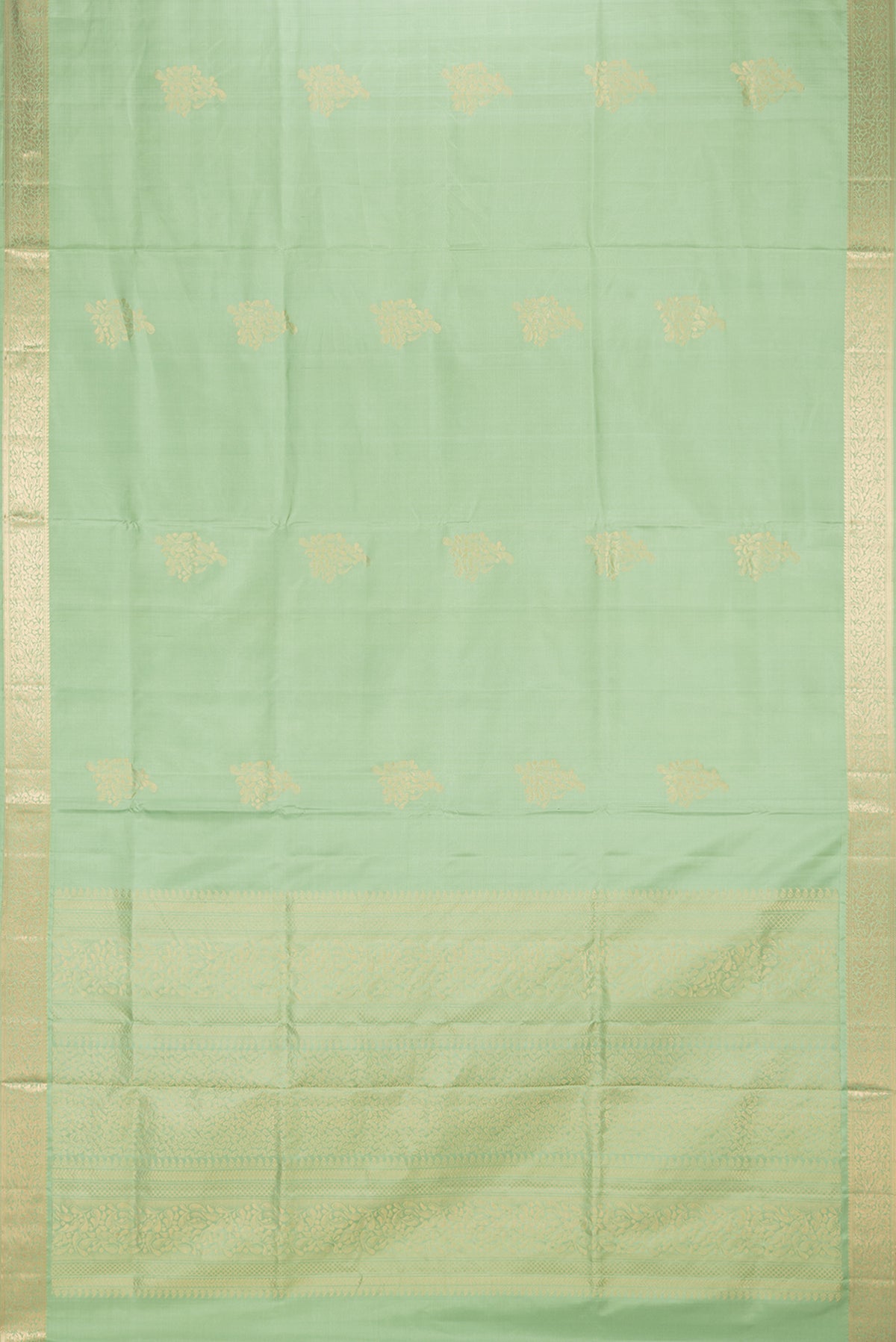 Flat view of Pure Silk Pista Green Soft Saree with Zari Butta on the body and Zari Border. 