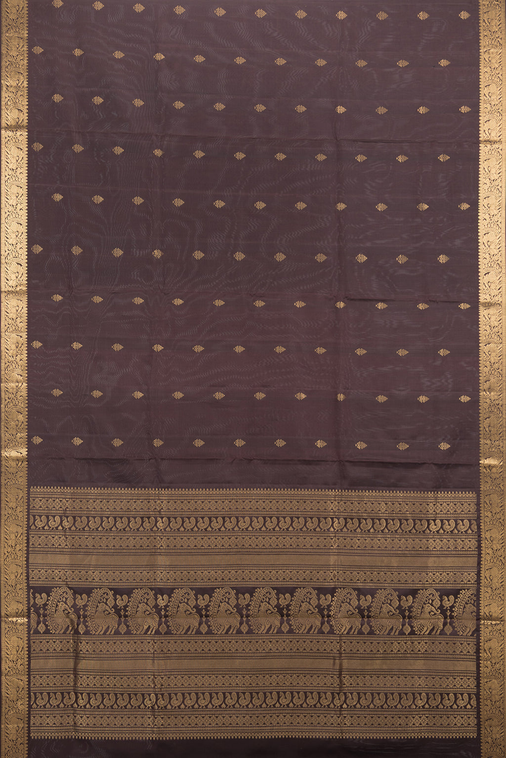 Flat view of Pure Silk Coffee Brown Soft Saree with Zari Butta on the body and Zari Border. 