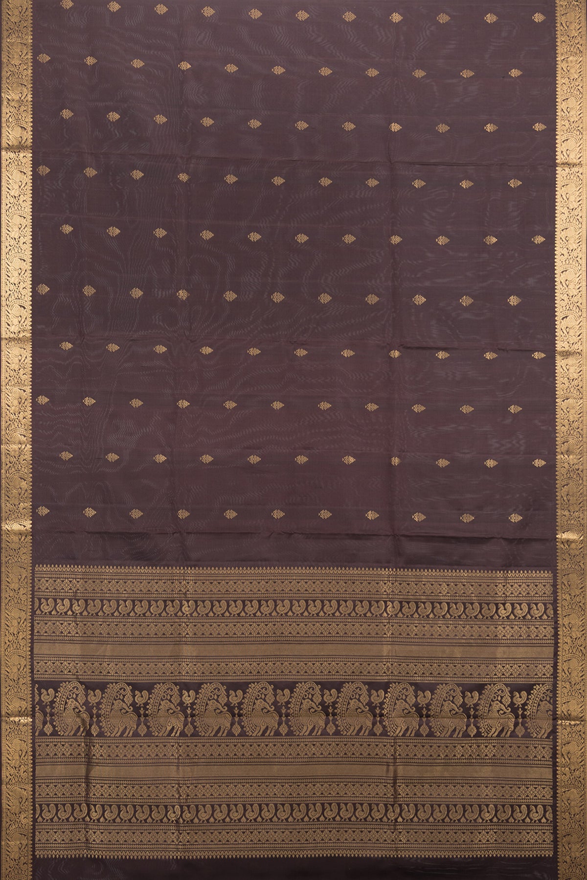 Flat view of Pure Silk Coffee Brown Soft Saree with Zari Butta on the body and Zari Border. 