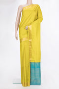 Pure Silk Yellow Soft Saree with Zari Butta on the body and Zari Border.  displayed on a mannequin