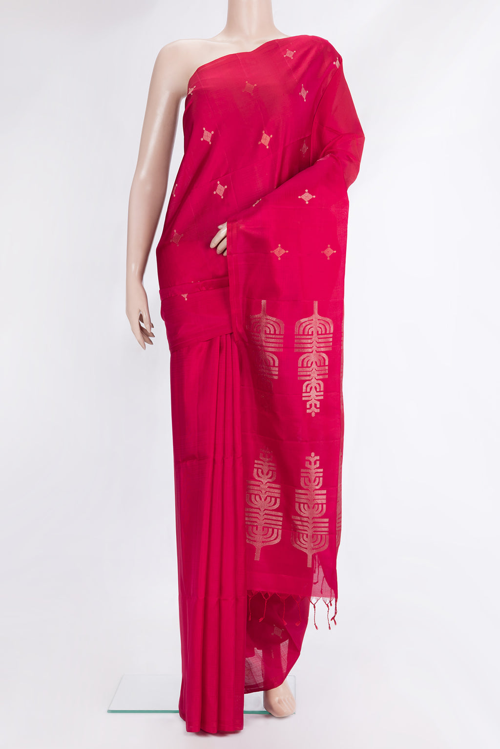 Pure Silk Dark Pink Soft Saree with Zari Butta on the body and Without Border.  displayed on a mannequin