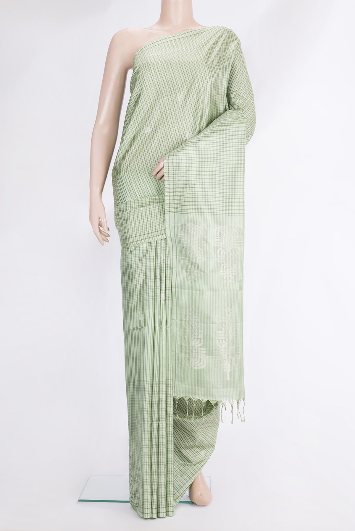 Pure Silk Pista Green Dual Tone Soft Saree with Checked design on the body and Thread Border.  displayed on a mannequin