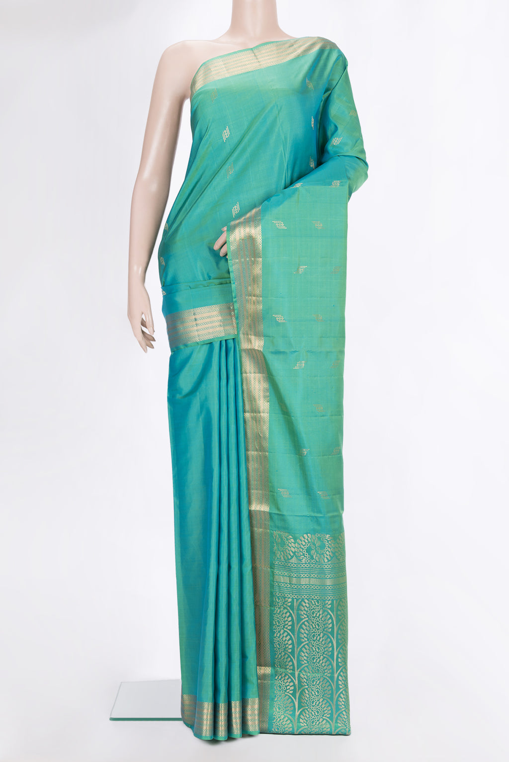 Pure Silk Sea Green Dual Tone Soft Saree with Zari Butta on the body and Zari Border.  displayed on a mannequin