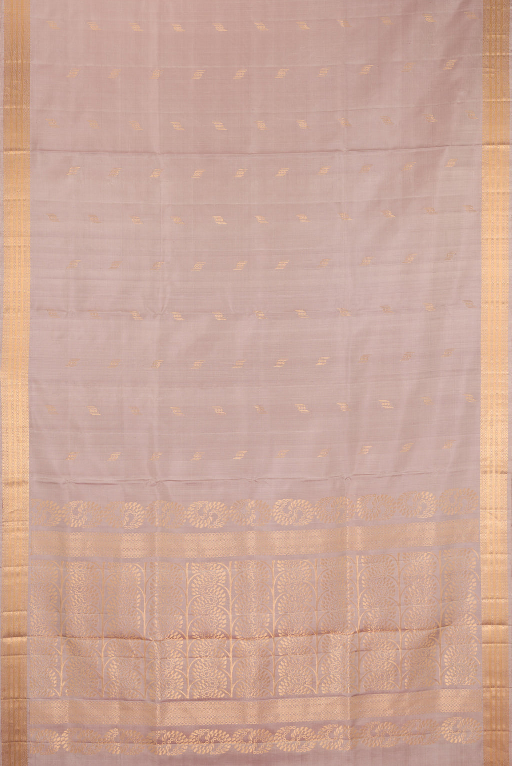 Flat view of Pure Silk Rose Gold Soft Saree with Zari Butta on the body and Zari Border. 