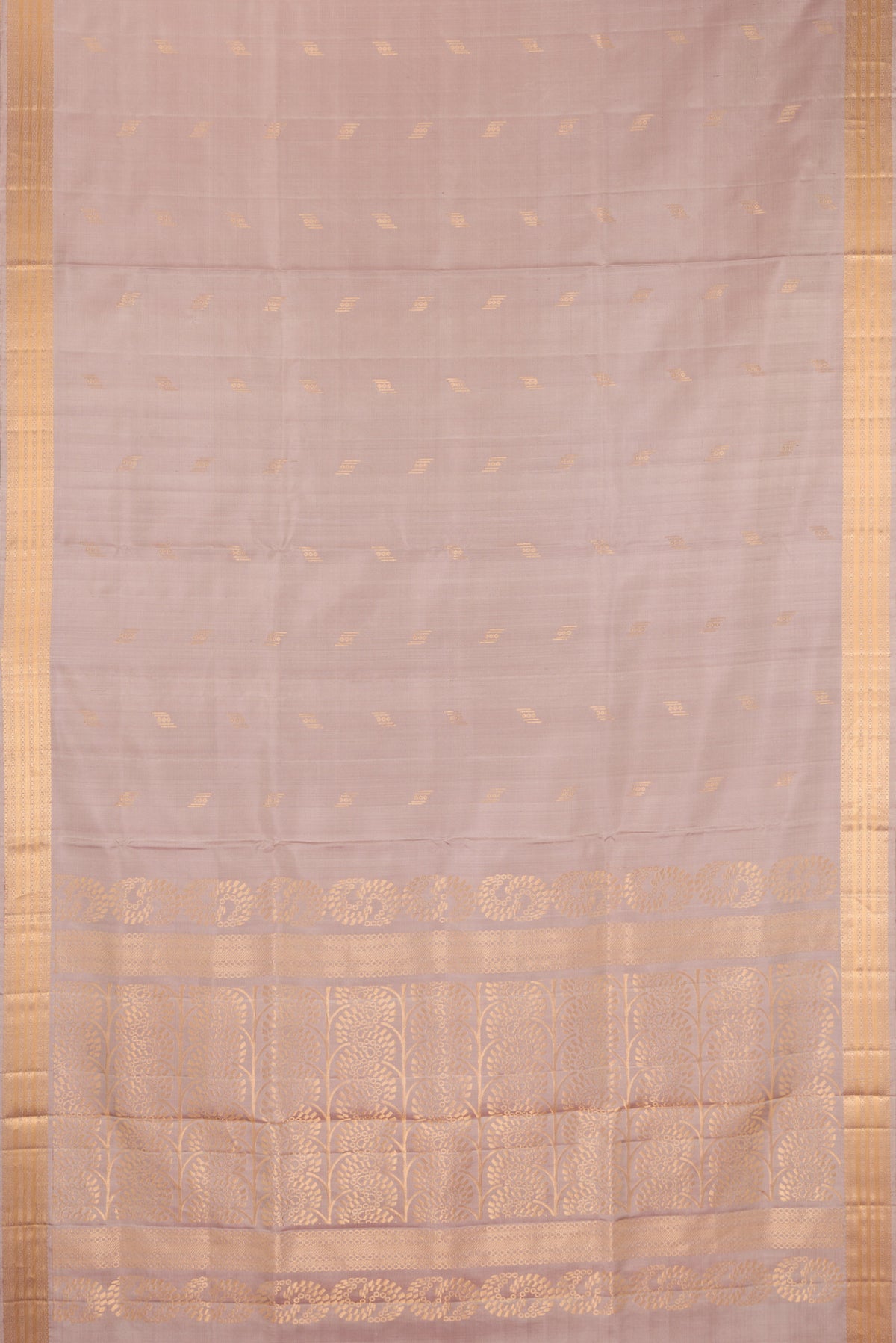 Flat view of Pure Silk Rose Gold Soft Saree with Zari Butta on the body and Zari Border. 