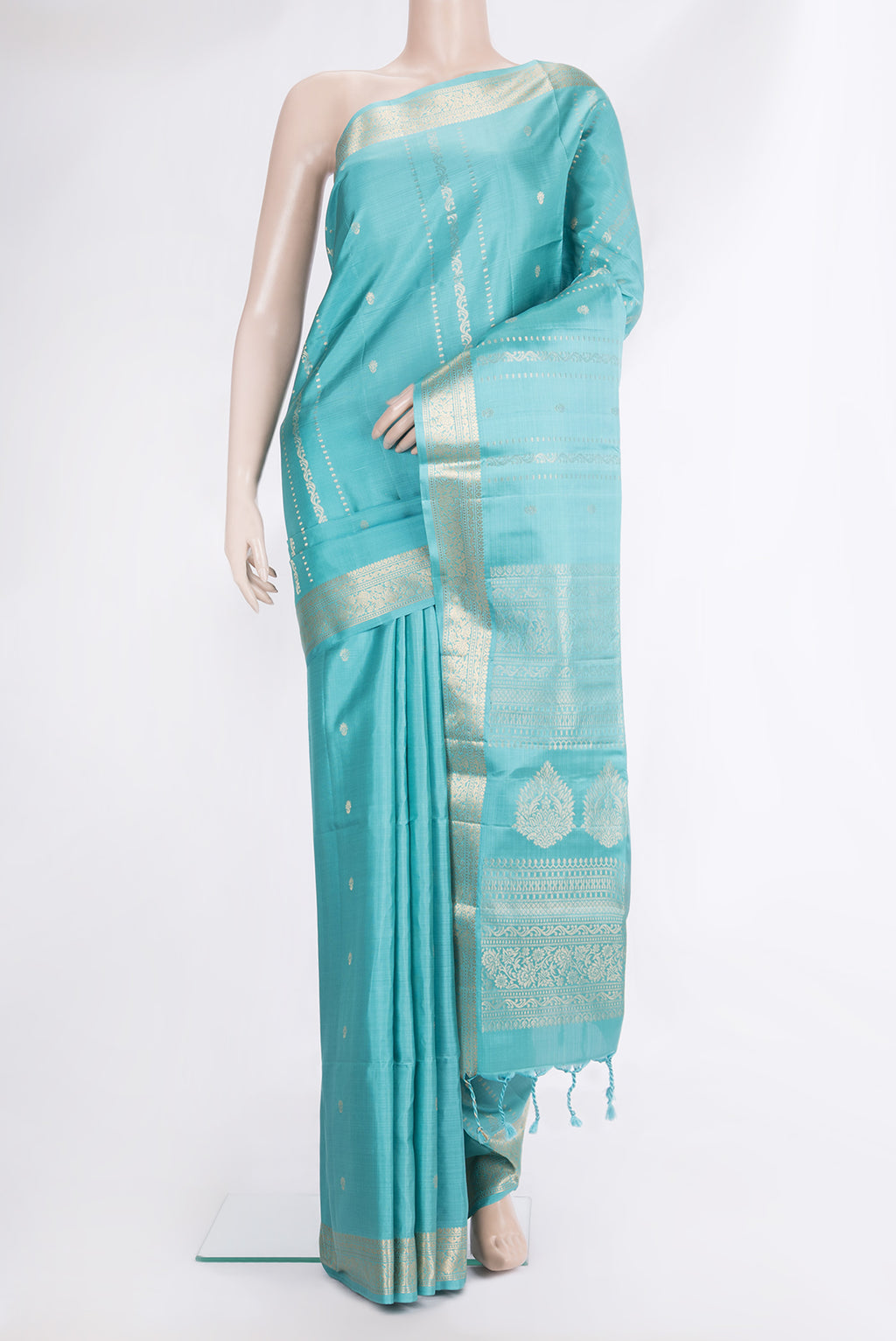 Pure Silk Sky Blue Soft Saree with Zari Butta on the body and Zari Border.  displayed on a mannequin