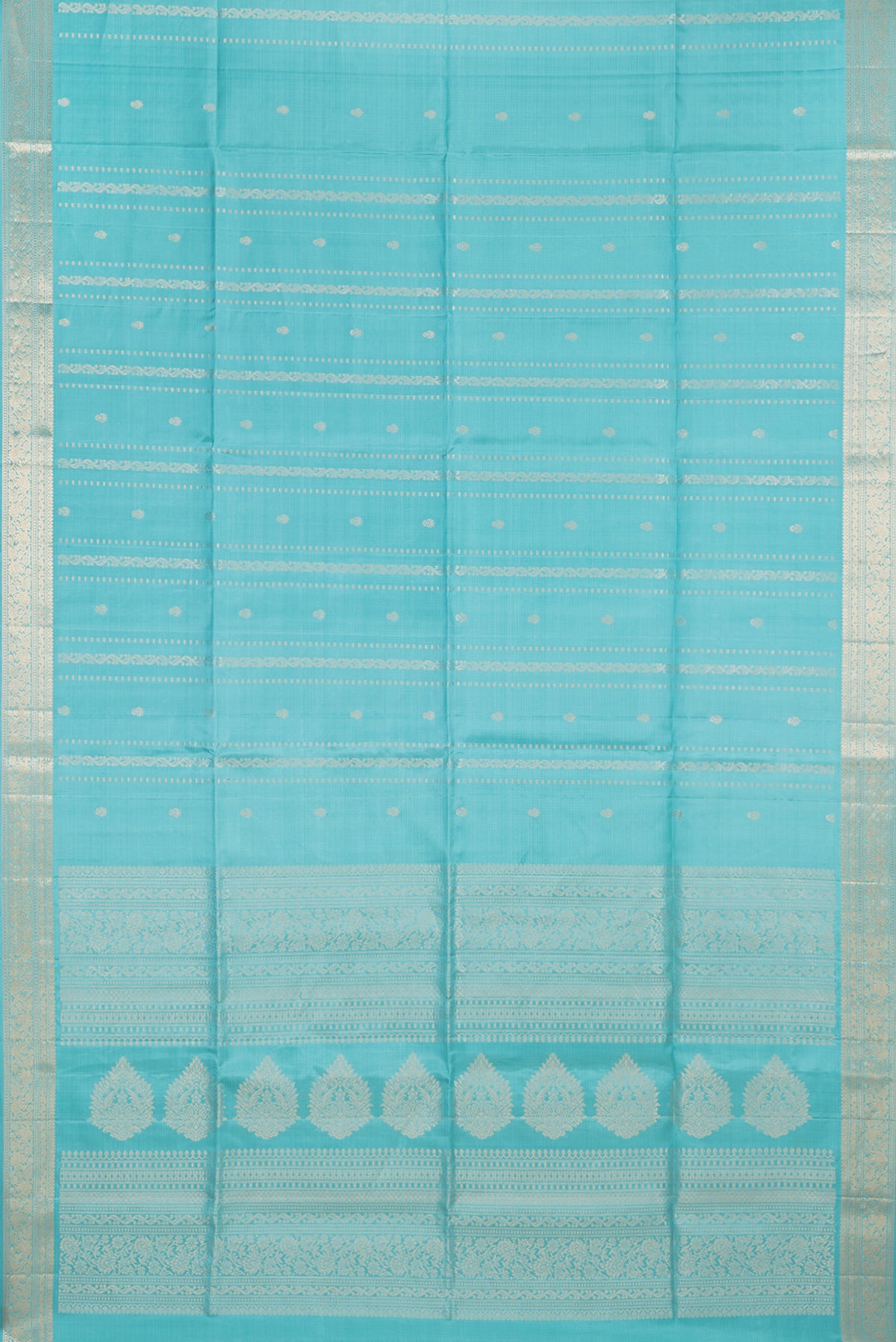 Flat view of Pure Silk Sky Blue Soft Saree with Zari Butta on the body and Zari Border. 