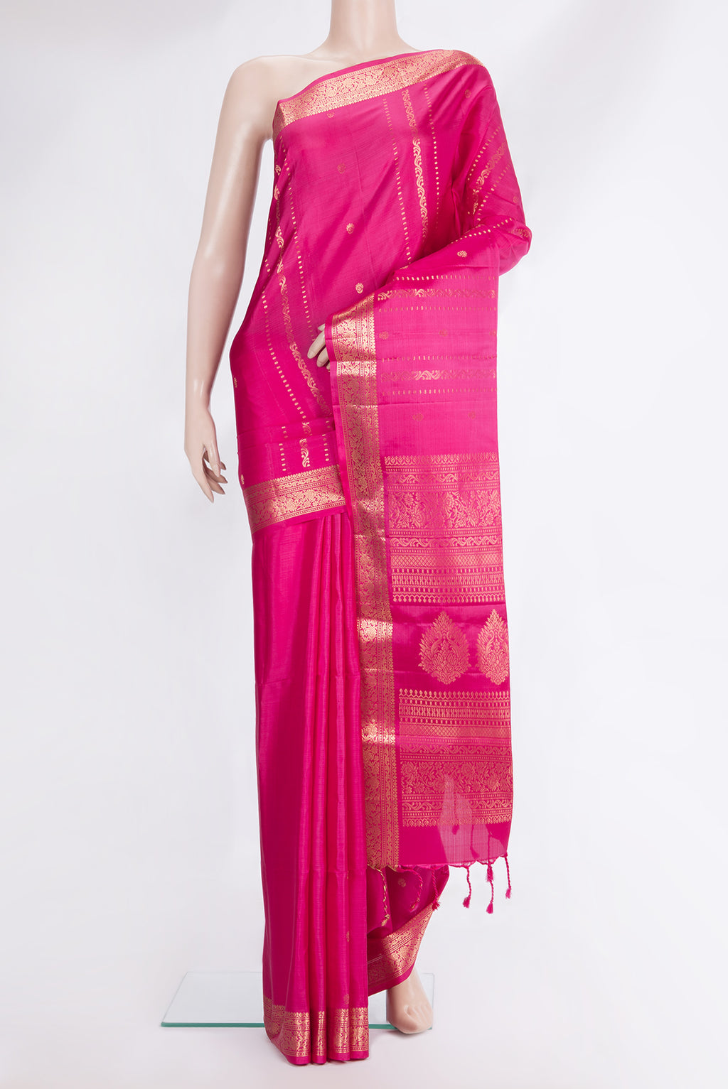 Pure Silk Dark Pink Soft Saree with Zari Butta on the body and Zari Border.  displayed on a mannequin