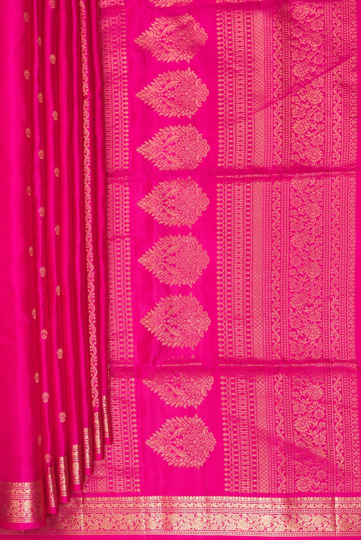 Pleats and pallu of Pure Silk Dark Pink Soft Saree with Zari Butta on the body and Zari Border. 