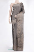 Pure Silk Grey Soft Saree with Zari Butta on the body and Fancy Border.  displayed on a mannequin